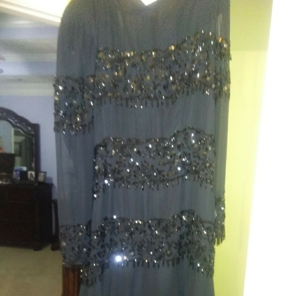 A dress long selves.  Black with rime stones